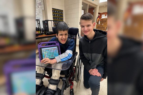  Two students pose for a photo